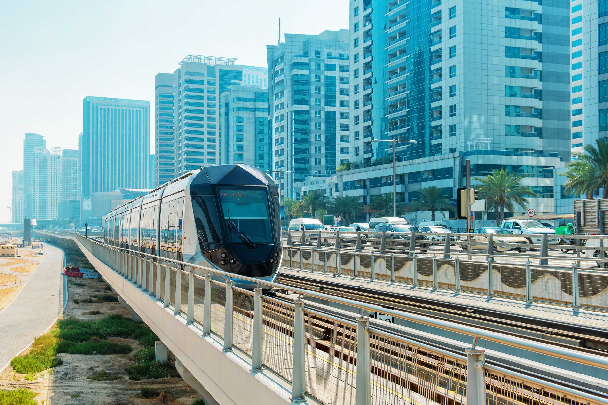 Dubai Metro Passing Through Modern Skyscrapers