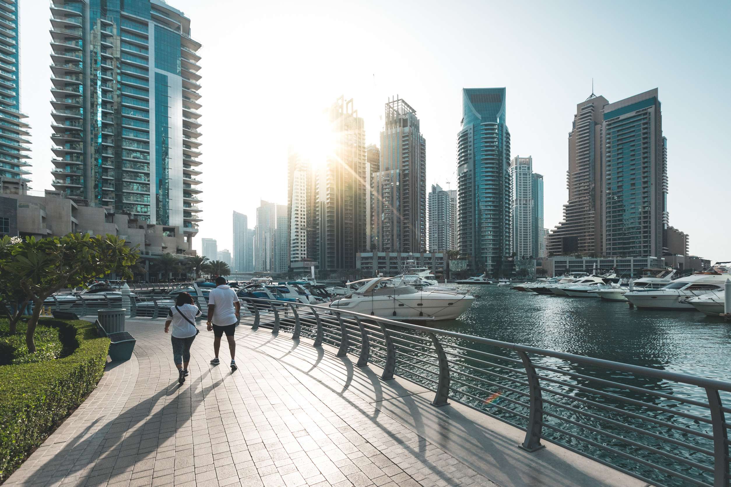 People Walking On The Promenade At The Dubai Marina