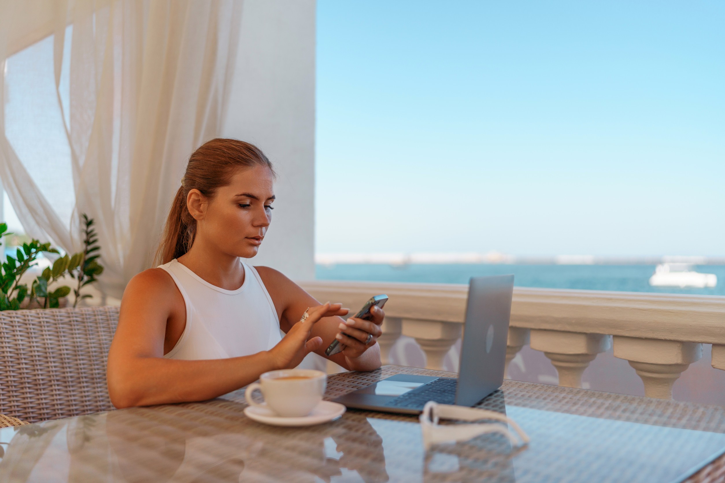 Woman With Coffee And Laptop